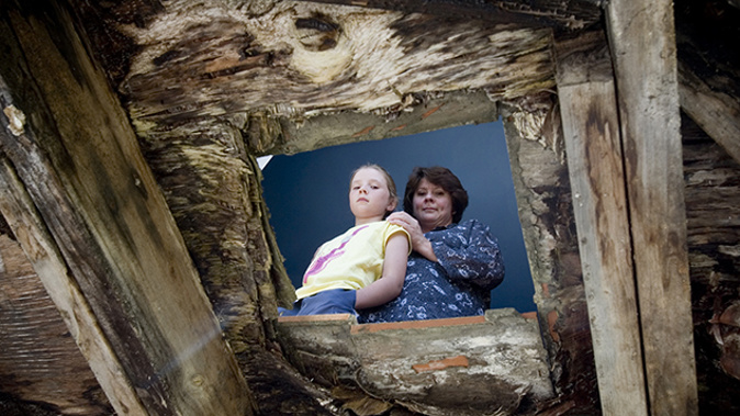 Wilna White and daughter Shani. Their leaky home developed a hole in the floor due to rotting. (Newspix) 