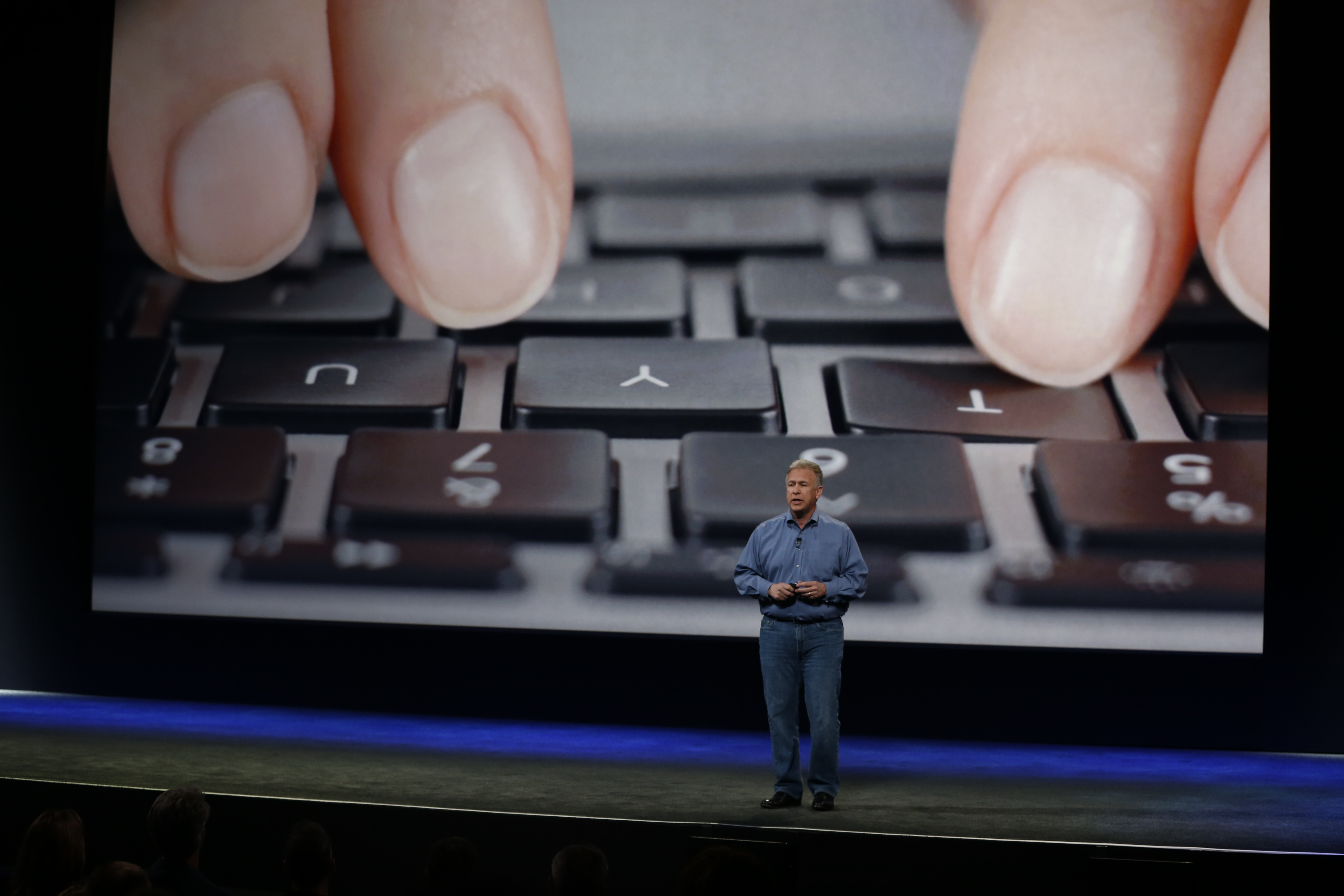 Apple Senior Vice President of Worldwide Marketing Phil Schiller announces the new MacBook during an Apple special event in San Francisco.