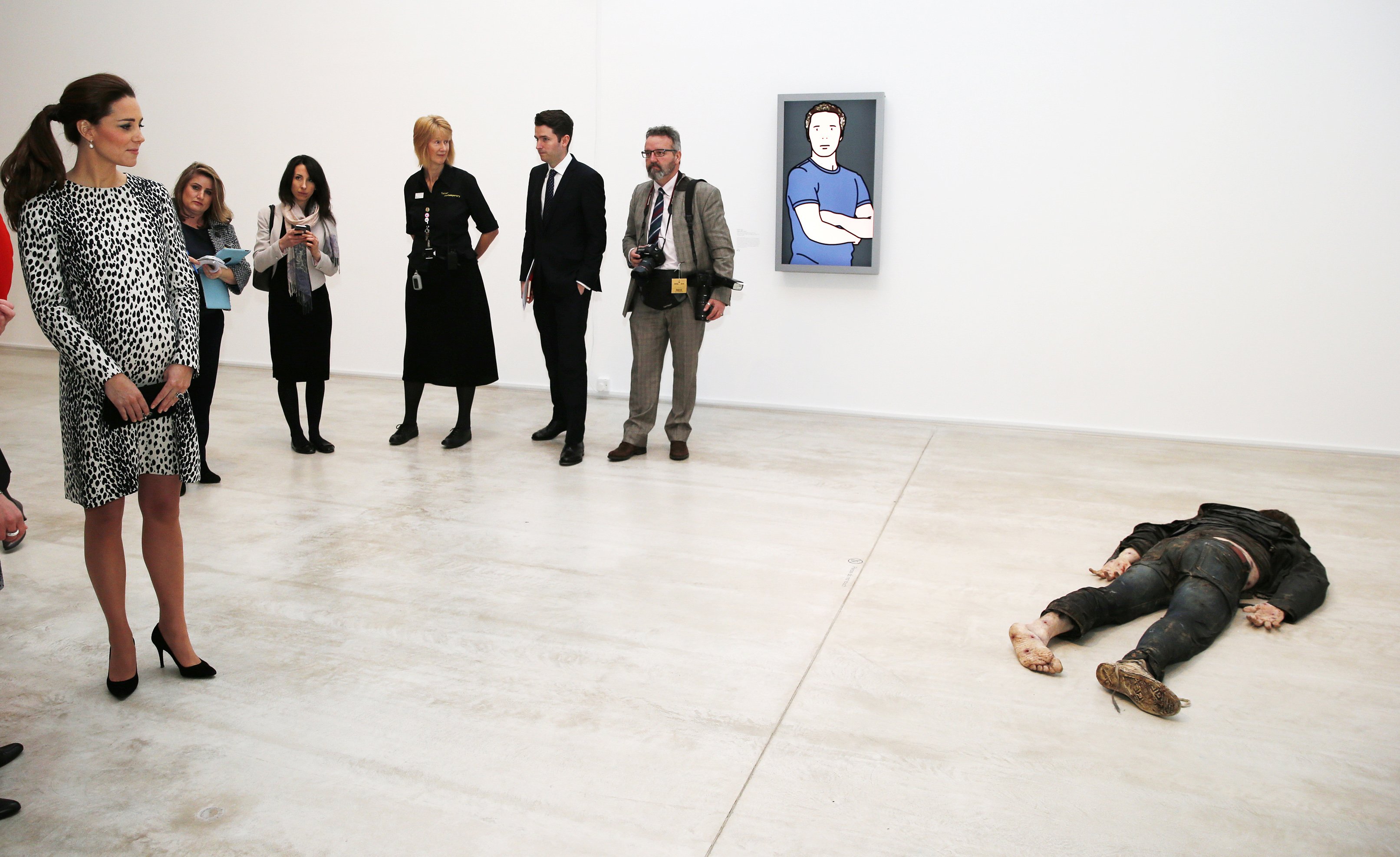  Catherine, Duchess of Cambridge looks at 'Self Portrait as a Drowned Man' by Jeremy Millar during a visit to Turner Contemporary Gallery.