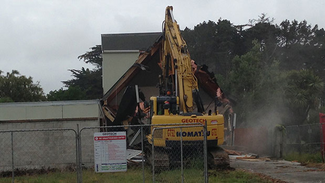 A red zoned house being demolished (Emily Murphy)