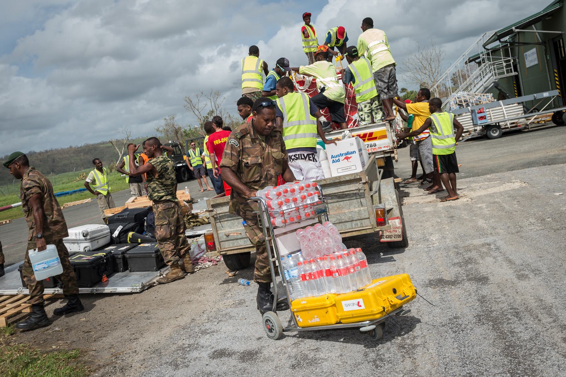 Soldiers unloading supplies in Vanuatu. 