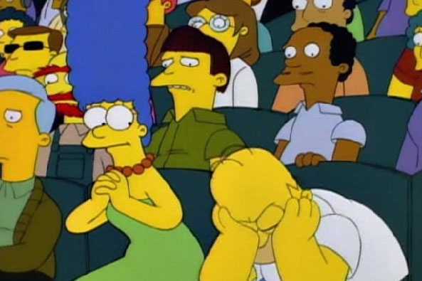 Check them out behind Marge and Homer!