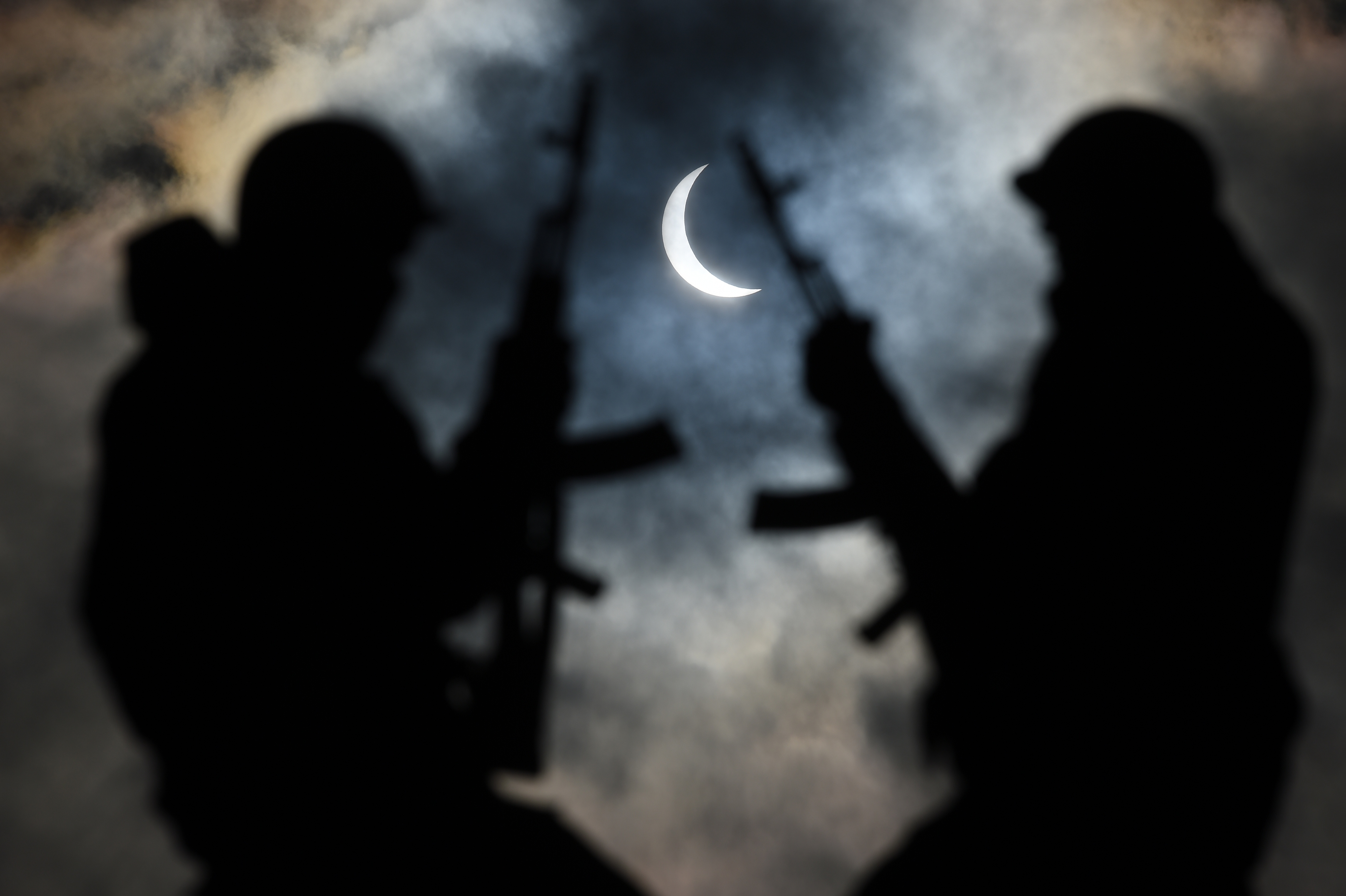 A partial solar eclipse is visible through Russian solders in the north of Russia.