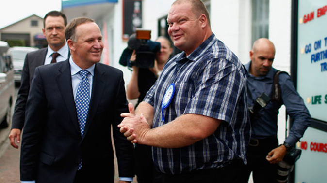 Prime Minister John Key speaks with locals during a walkabout with the National Party candidate for Northland Mark Osborne on March 26, 2015 in Dargaville (Getty Images) 