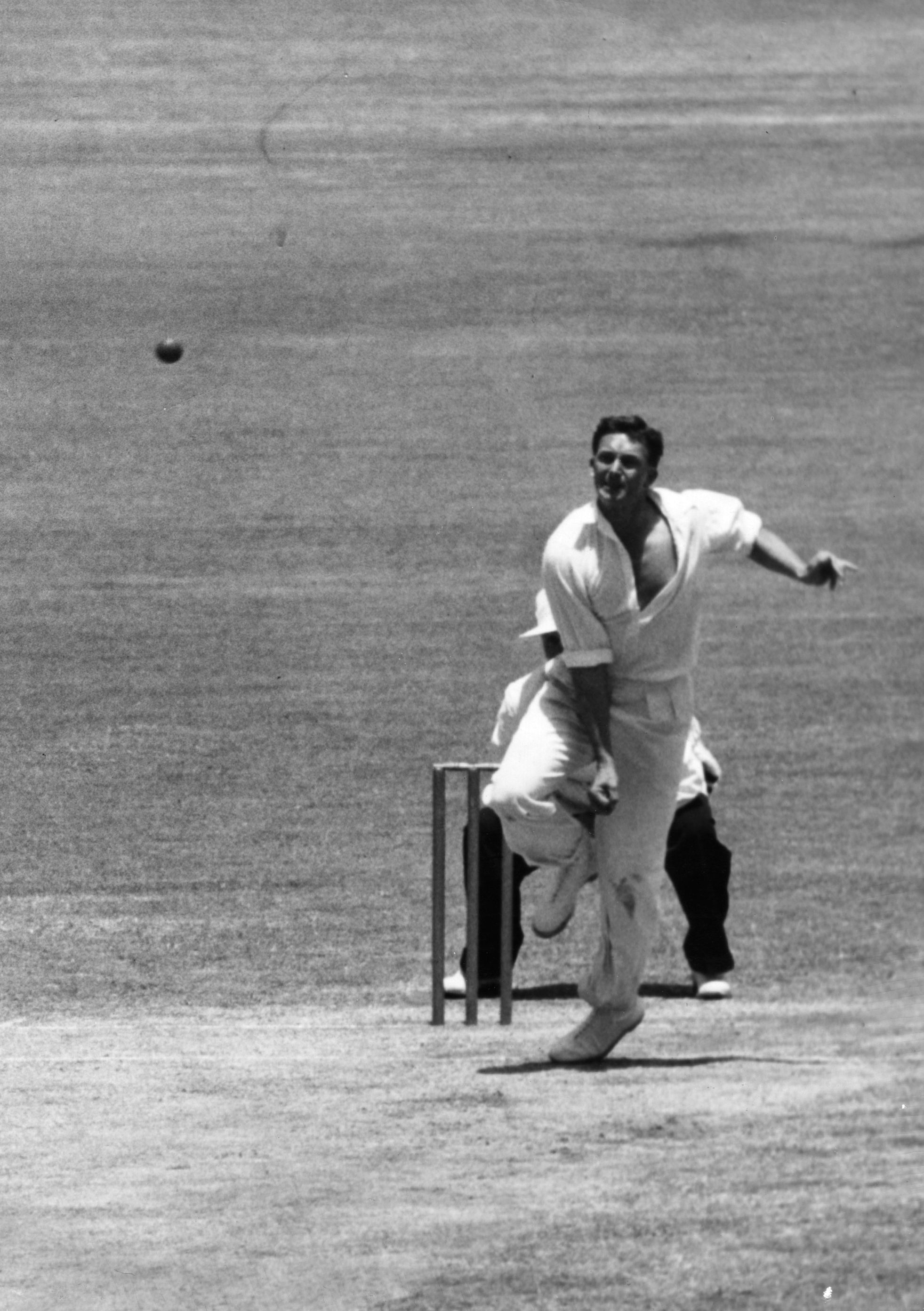 Richie Benaud, the Australian all-rounder, bowling during a match in Sydney (1958) 