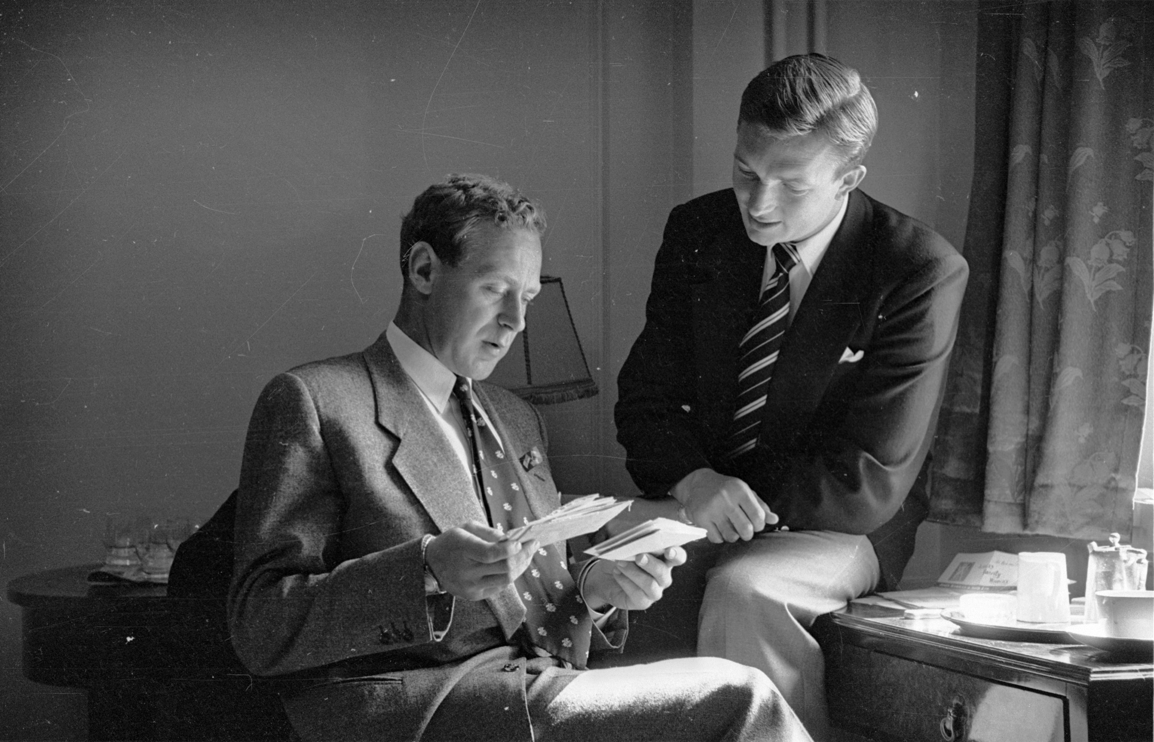 Australian cricketers, vice-captain and left-handed opening batsman Arthur Morris (left), and bowler Richie Benaud (1953)