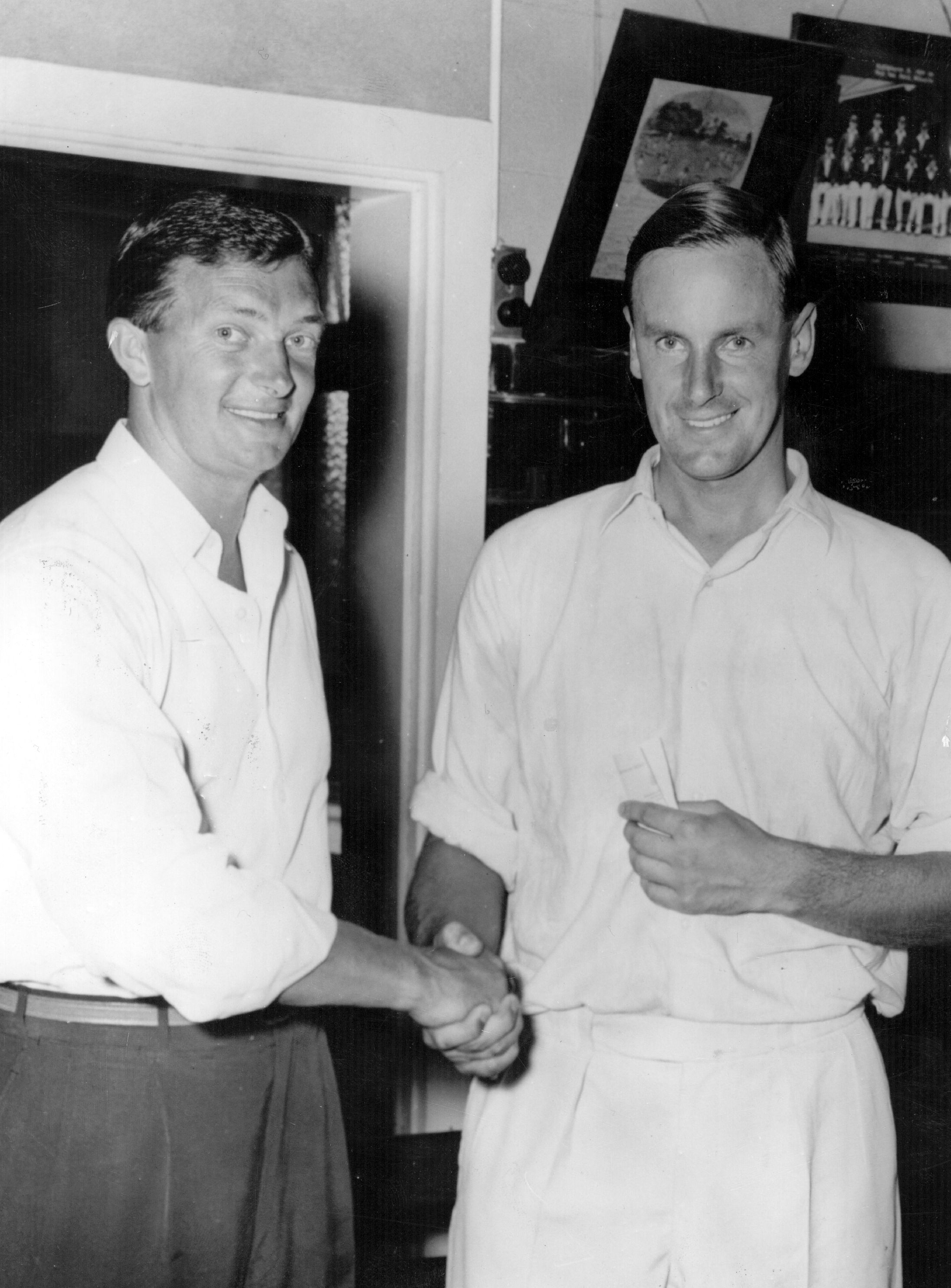 Richie Benaud, the Australian captain, seen shaking hands with Peter May, the England captain, following the Australian victory in the fourth Test Match at Adelaide (1959) 