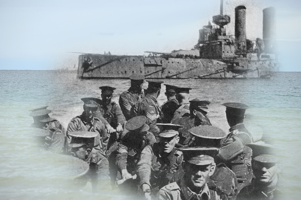 Australian infantrymen sitting on a transport boat as they head towards the beach at the Gallipoli Peninsula