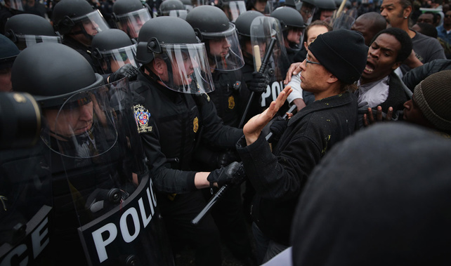 Protesters clash with police during a march in honor of Freddie Gray on April 25, 2015 (Getty Images) 