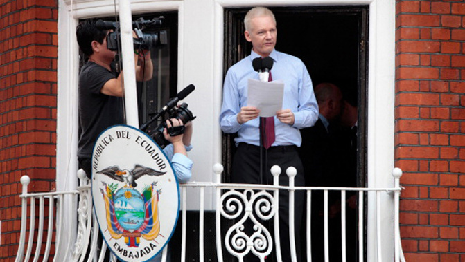 Julian Assange on the balcony of the Ecuadorian embassy. (Getty Images) 