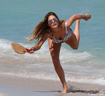 She mightve hung up her Victorias Secret Angel wings but Doutzen Kroes showed shes still every inch the swimsuit model as she turned Miami Beach into a catwalk as she hot the sand in a wild lion print swimming costume.
The Blonde Beauty, who is known...