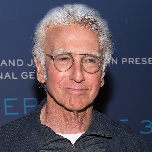 ...looks like he's feeling good about his full head of hair, even if he does have a few greys.