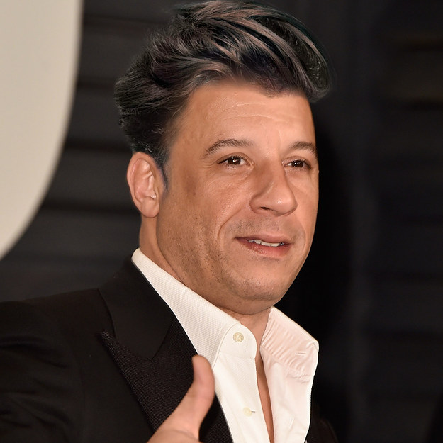 ...trades his hard image for a suave exterior when he lets his hair grow out. 