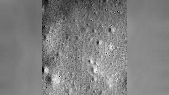 The final photo sent by NASA's Messenger probe showing the surface of Mercury (Supplied)