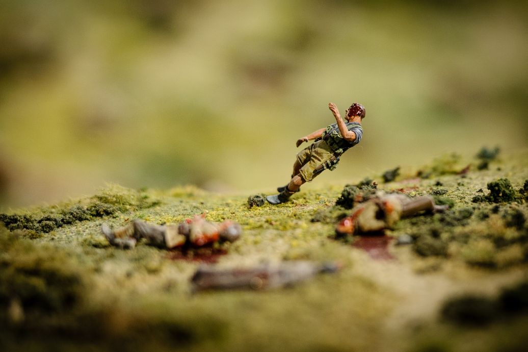 A detail of the battle field showing a soldier getting hit by enemy fire. WELLINGTON, NEW ZEALAND - May 04: Opening of "Gallipoli: the New Zealand Story in Colour"  Great War Exhibition, Pukeahu National War Memorial, Buckle St, Wellington May 04, 2015 in Wellington, New Zealand. (Photo by Mark Tantrum/ mark tantrum.com)