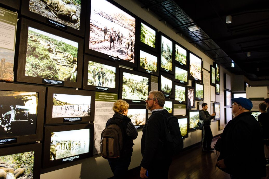 The first of the general public enter and explore the new part of the exhibition. WELLINGTON, NEW ZEALAND - May 04: Opening of "Gallipoli: the New Zealand Story in Colour"  Great War Exhibition, Pukeahu National War Memorial, Buckle St, Wellington May 04, 2015 in Wellington, New Zealand. (Photo by Mark Tantrum/ mark tantrum.com)