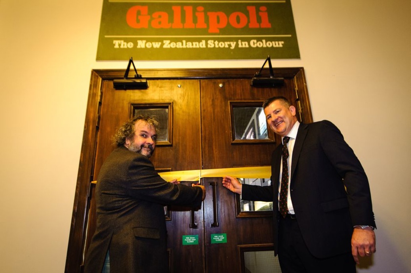 Sir Peter Jackson and John Bennett – ANZ General Manager - Central Region cut the ribbon to "Gallipoli: the New Zealand Story in Colour"  Great War Exhibition, Pukeahu National War Memorial, Buckle St, Wellington May 04, 2015 in Wellington, New Zealand. (Photo by Mark Tantrum/ mark tantrum.com)