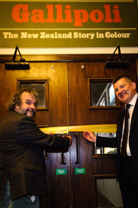 Sir Peter Jackson and John Bennett – ANZ General Manager - Central Region cut the ribbon to "Gallipoli: the New Zealand Story in Colour"  Great War Exhibition, Pukeahu National War Memorial, Buckle St, Wellington May 04, 2015 in Wellington, New Zealand. (Photo by Mark Tantrum/ mark tantrum.com)