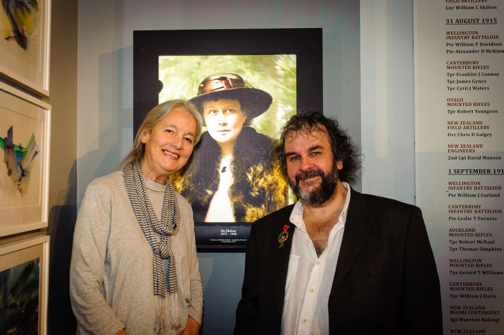 UK based artist Anita Young with Sir Peter Jackson in front of a portrait of Anita's grandmother. WELLINGTON, NEW ZEALAND - May 04: Opening of "Gallipoli: the New Zealand Story in Colour"  Great War Exhibition, Pukeahu National War Memorial, Buckle St, Wellington May 04, 2015 in Wellington, New Zealand. (Photo by Mark Tantrum/ mark tantrum.com)