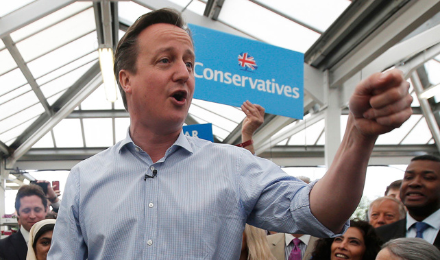 British Prime Minister David Cameron speaks to supporters during an election rally at Squires garden centre on May 5, 2015 in Twickenham, London (Getty Images) 