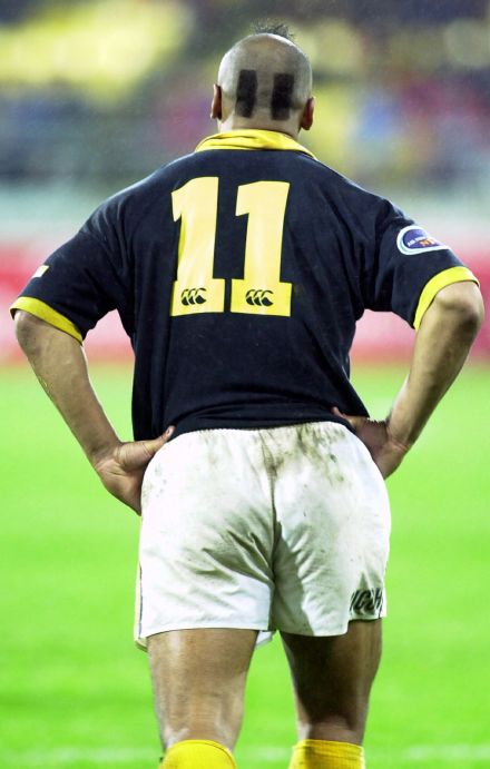 And then there was this memorable hairstyle. Lomu playing for the Wellington Lions in 2001, a year after they won the title.