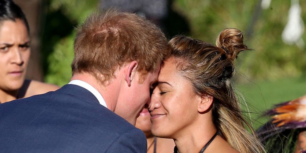 Prince Harry performs a hongi as he attends a ceremony of Welcome at Government House. Photo / Pool