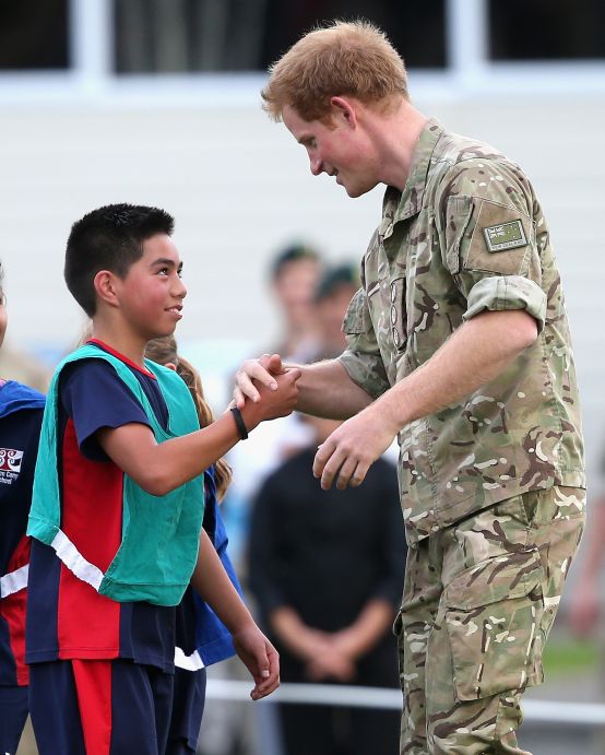  Prince Harry plays touch rugby with Schoolchildren during a visit to Linton Military Base / Photo: Getty Images