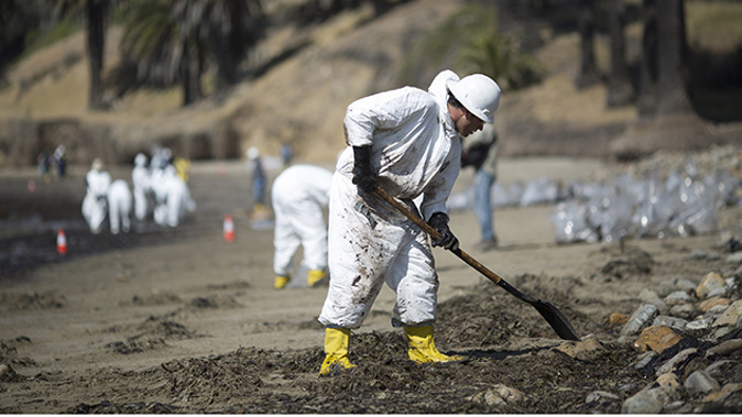 A worker cleans up in California (Getty Images) 