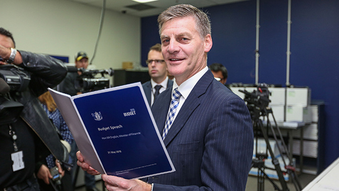 Bill English with the 2015 Budget (Getty Images) 