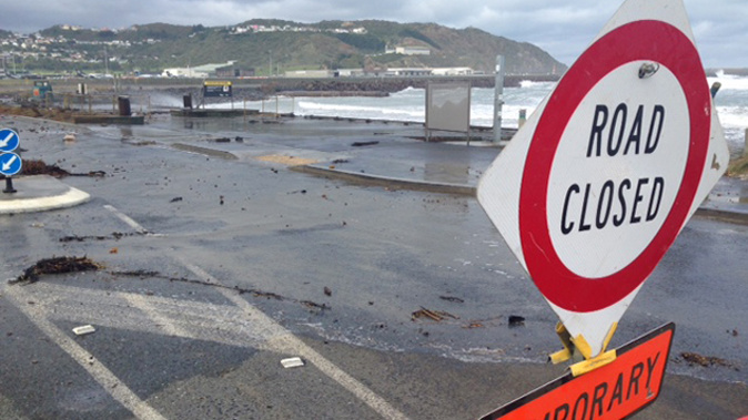 Debris on the road at Moa Point after a swell went over the sea wall (Laura Dooney) 