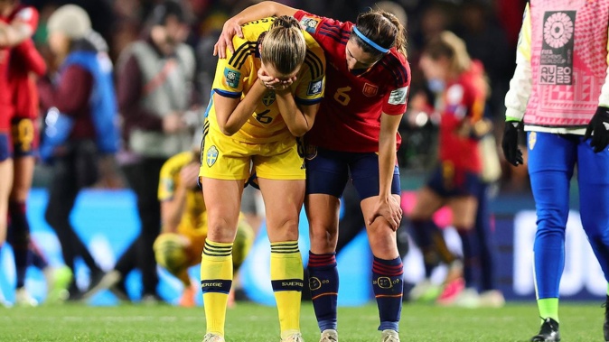 Magdalena Eriksson of Sweden is dejected after losing as Aitana Bonmati of Spain offers support. Photosport