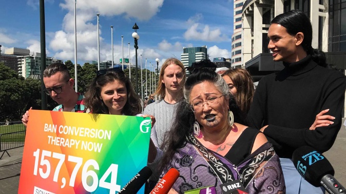 Green Party MPs Chloe Swarbrick, Marama Davidson and Elizabeth Kerekere deliver a 150,000-signature petition to Parliament calling for a ban on conversion therapy. (Photo / Sophie Trigger)