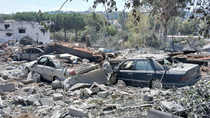 A view of damage following the Israeli army's attack on Nabatieh Governorate, Lebanon on September 24, 2024. A house was damaged in the attack and surrounding vehicles were also became unusable. (Photo by Stringer/Anadolu via Getty Images)