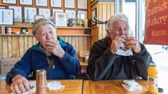 Don Shatford (left) and Doug Brown enjoying a bite to eat at Patrick's Pies in Bethlehem after Patrick Lam won Bakels NZ supreme award for one of his pies. Photo / Alex Cairns