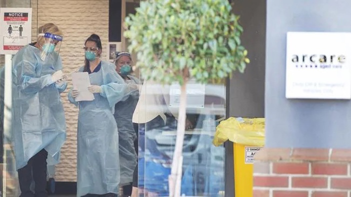 Staff at Arcare Maidstone, which is now in full lockdown after mystery case. Photo / news.com.au