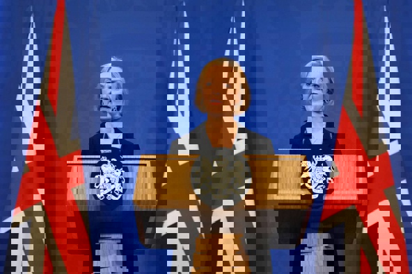 Liz Truss attends a press conference in the Downing Street Briefing Room in central London on Friday October 14, 2022, following the sacking of the finance minister in response to a budget that sparked markets chaos. Photo / AP