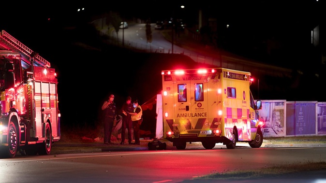 Emergency services were alerted to a car that crashed into a fence at the intersection of Rush Creek Drive and Westgate Drive in Auckland's Massey at around 3.40am. Photo / Hayden Woodward