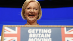 Britain's Prime Minister Liz Truss laughs during her speech at the Conservative Party conference at the ICC in Birmingham. Photo / AP