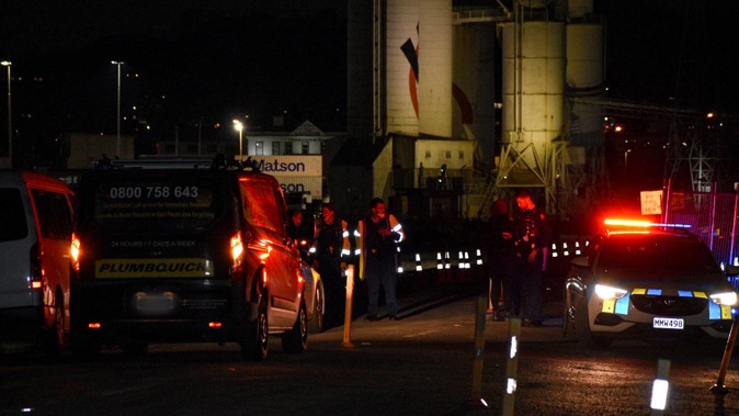 Police at Onehunga Wharf after a car was driven into the Manukau Harbour yesterday evening. Photo / Darren Masters