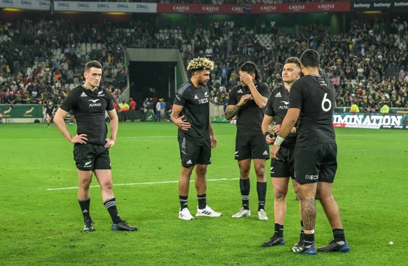 Dejected All Black players after losing the match during the New Zealand All Blacks v South Africa Springboks rugby union match at Mbombela Stadium. (Photo / Photosport.co.nz)