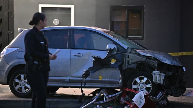 A vehicle drove into a crowd in Hollywood, injuring more than 20 people overnight. Photo / AFP