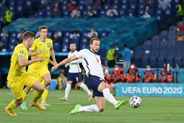 Harry Kane scores the first of his two goals against Ukraine in England's 4-0 quarter-final win. (Photo / Getty)