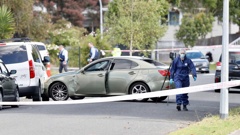 A vehicle of interest remains at the scene on Addington Ave, Manurewa, where two people were shot. Photo / Dean Purcell