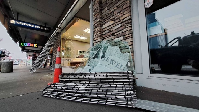 Kelso checked his security camera footage in the early hours of Monday morning to find a car planted in his shop’s entrance. Photo / NZME