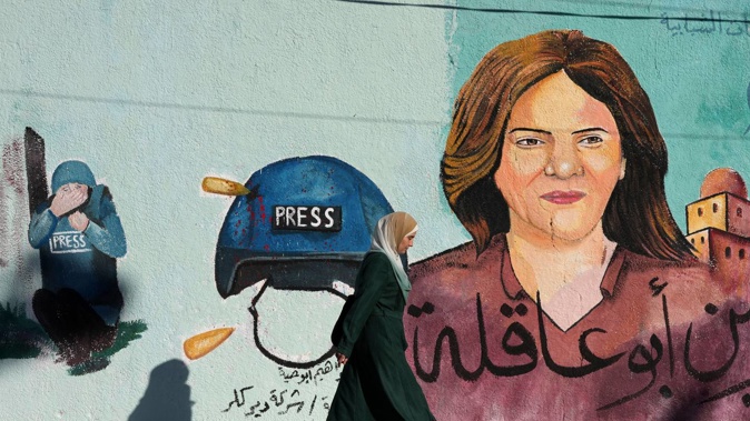 A mural of slain of Al Jazeera journalist Shireen Abu Akleh adorns a wall, in Gaza City. (Photo / Adel Hana, AP)