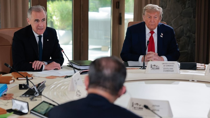 Canadian Prime Minister Mark Carney (left) said Ottawa will adjust counter tariffs if no deal is reached. Photo / Chip Somodevilla via Getty Images