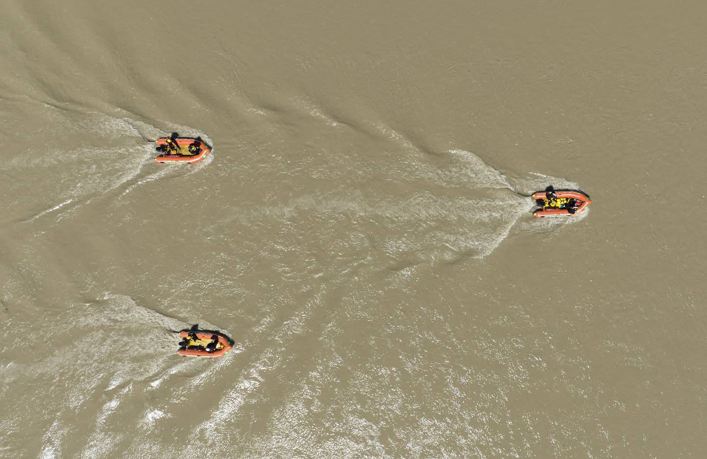 An aerial view of surf lifesaving SAR teams searching the Ngaruroro River. Photo / George Heard