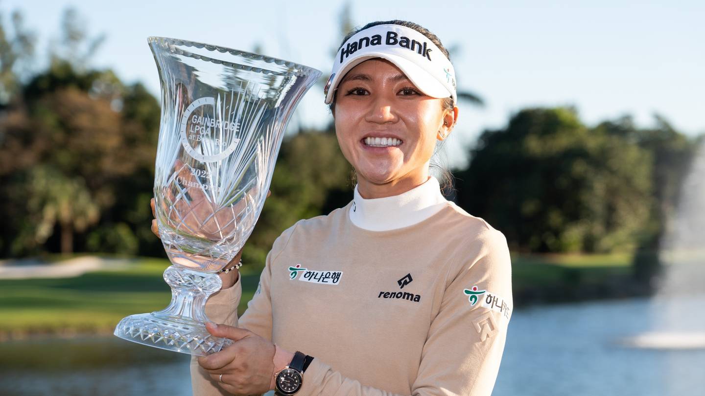 Lydia Ko with the Gainbridge LPGA trophy she won in January. Photo / Photosport
