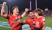 Macca Springer (from left), Rivez Reihana and James O'Connor celebrate the Crusaders' win over the Chiefs. Photo / Getty Images