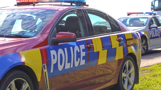 Police are on the scene of a fire in Waikiwi, Invercargill after a car crashed into a property, starting the blaze.